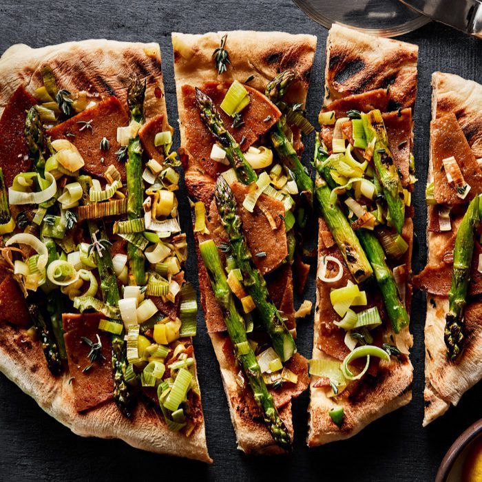 Grilled Asparagus Pizza with Leek, Preserved Lemon and Pine Nuts